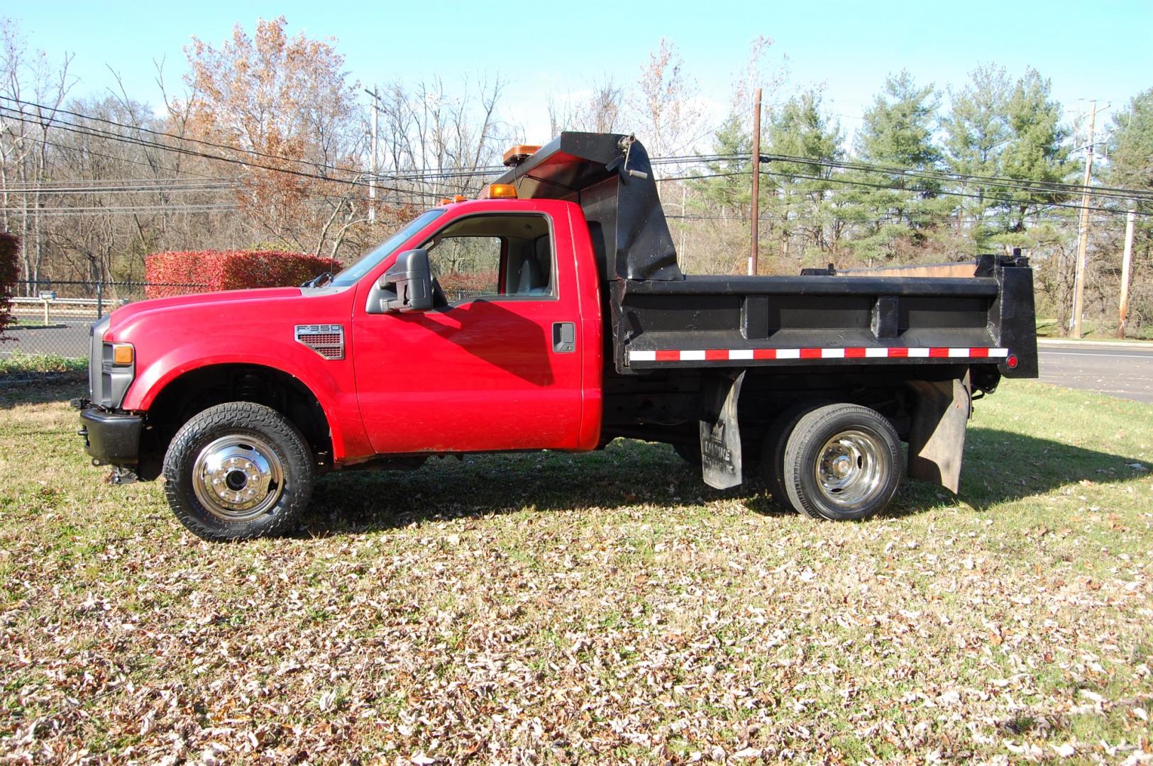 2008 RED /Grey Vinyl Ford F-350 SD XL DRW 4WD (1FDWF37R68E) with an 6.4L V8 OHV 32V TURBO DIESEL engine, Manual transmission, located at 6528 Lower York Road, New Hope, PA, 18938, (215) 862-9555, 40.358707, -74.977882 - This vehicle has a reconstructed title. Here we have a 2008 Ford F350 dump body with a 6.4L V8 Diesel engine putting power to the ground via a manual shifting 4X4 transmission. The interior offers grey leather, AC/HEAT, AM/FM radio, roll up windows and front airbags for safety. The exterior offers r - Photo#2